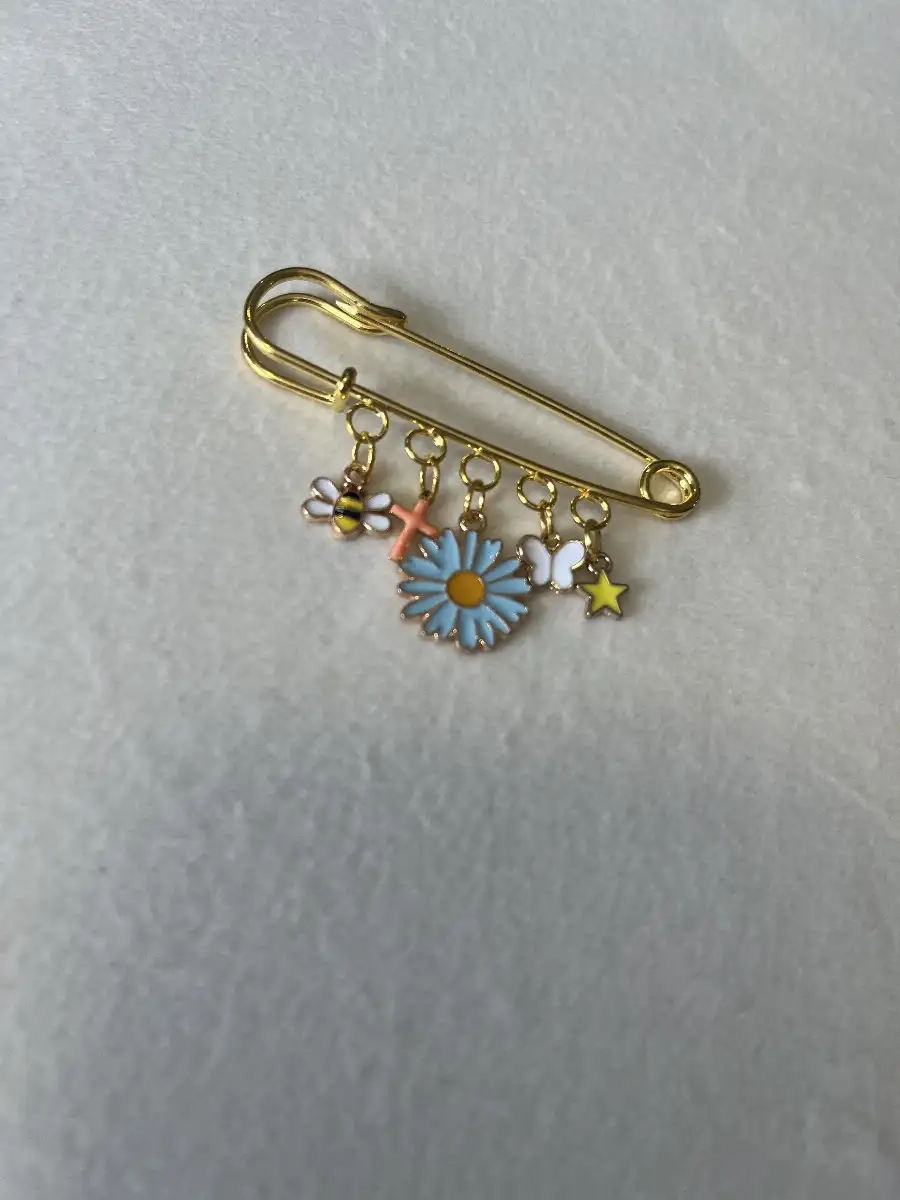 Broche 6.