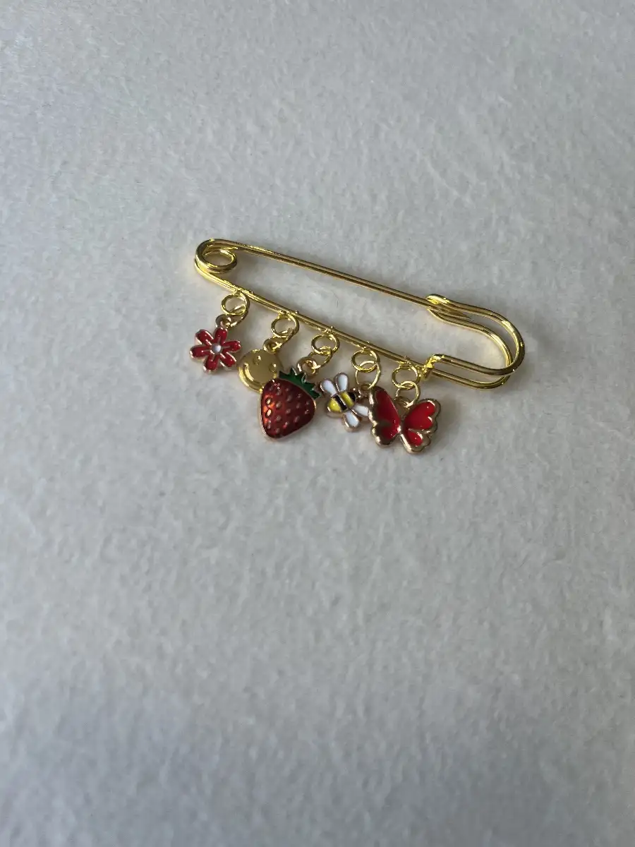 Broche 10.