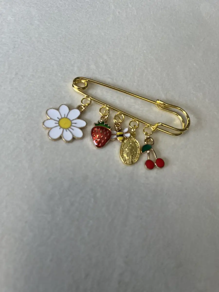 Broche 12.