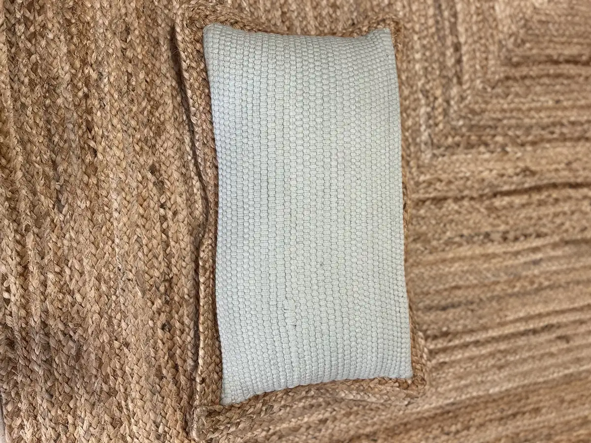 Housse de coussin vert d’eau
